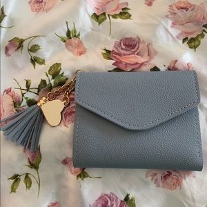 Tri-fold faux leather wallet!!